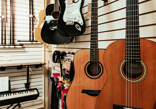 Guitars hanging on a wall