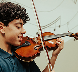 A boy playing violin