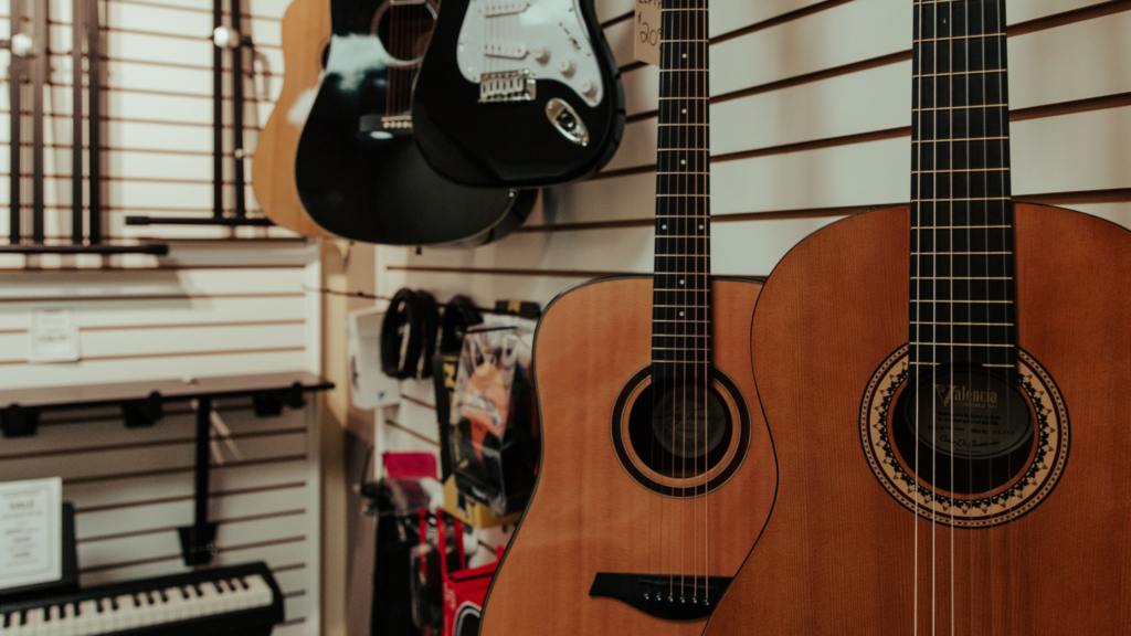 Beginner guitars and a Roland digital piano available for instrument rentals in Newmarket